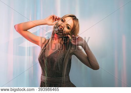 Pandemic Fashion. Quarantine Party. Festive Look. Glamour Woman In Chain Crystal Face Mask Matching 