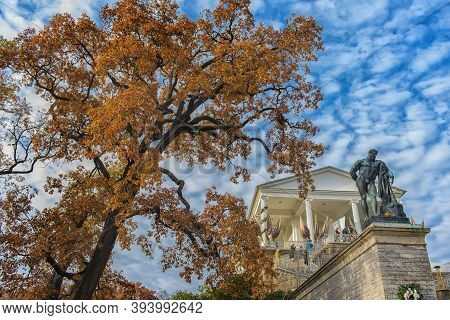 Scene From Catherine Park With View Past Hanging Branches To The Statue Of Hercules, Pushkin, Russia