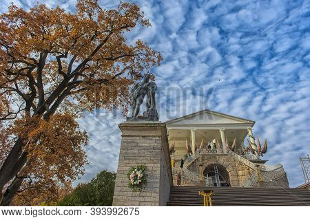Scene From Catherine Park With View Past Hanging Branches To The Statue Of Hercules, Pushkin, Russia