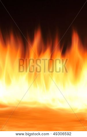 Fire flames raising in a dark background