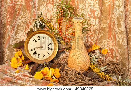 still life with clock, mushrooms and sea-buckethorn