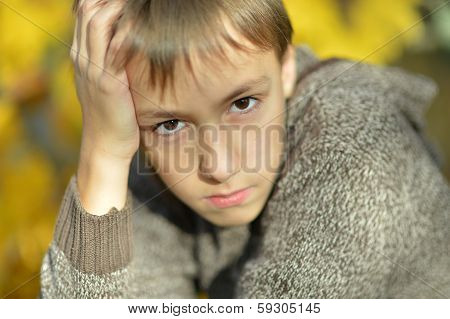 Portrait of a sad little boy