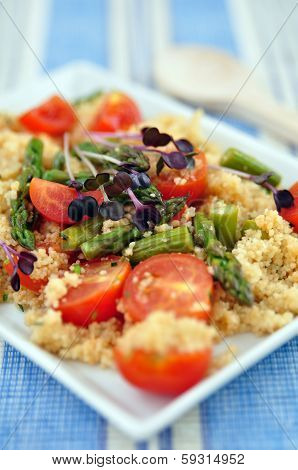Healthy Couscous Salad with tomatoes and green asparagus