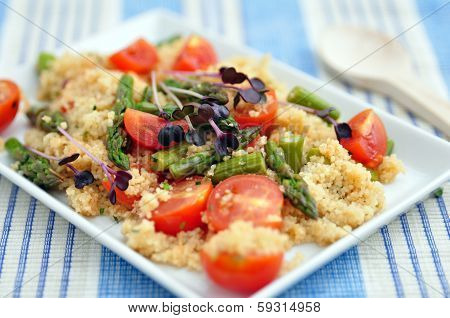 Healthy Couscous Salad with tomatoes and green asparagus