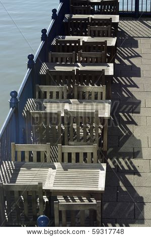 Table And Chairs At Brighton Marina. England