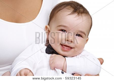 Closeup portrait of elegant beautiful baby boy smiling happy.