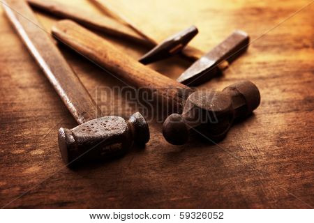 Old Hammers on a old wooden workdesk