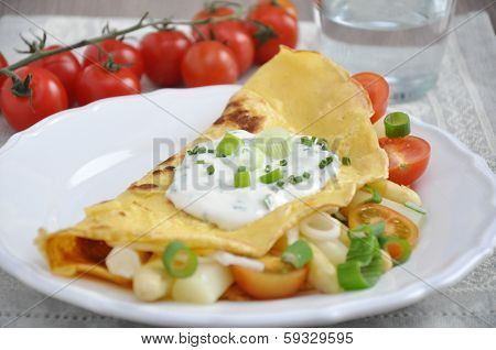 Pancakes filled with Asparagus and fresh vegetables.