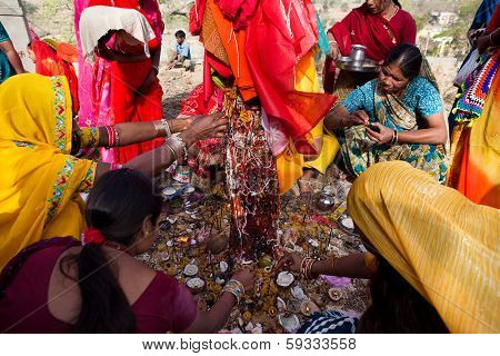 RAJASTHAN, INDIA - MARCH 21, 2009: woman of the countryside are celebrating the god who protect them in the Gangaur festival one of the most important of the year