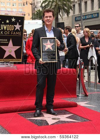 LOS ANGELES - MAY 23:  Simon Fuller arrives to the Walk of Fame Ceremony for Simon Fuller  on May 23, 2011 in Hollywood, CA                
