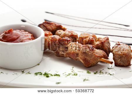 Skewered Meat with Red Sauce
