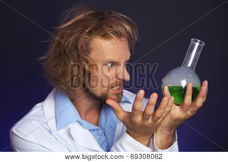 Crazy scientist working in laboratory