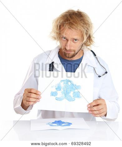 Funny psychotherapist holding Rorschach test