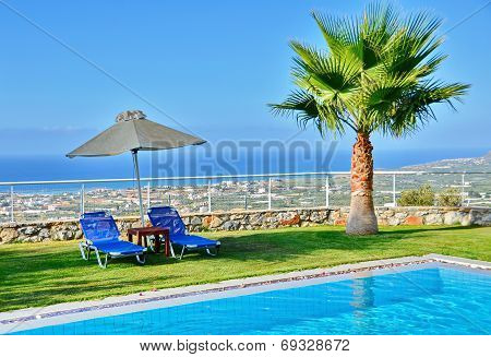 Lounge Chairs By The Pool
