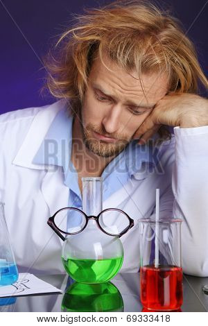 Crazy scientist working in laboratory