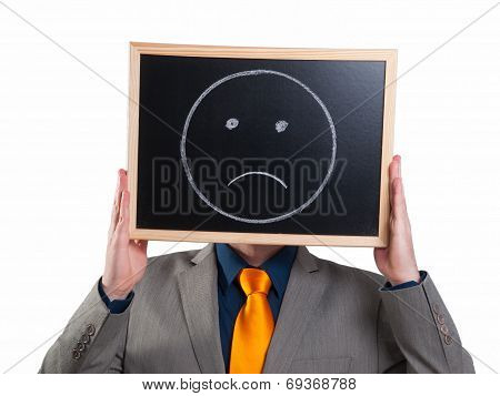Businessman Hiding His Face With A White Billboard With A Sad Face