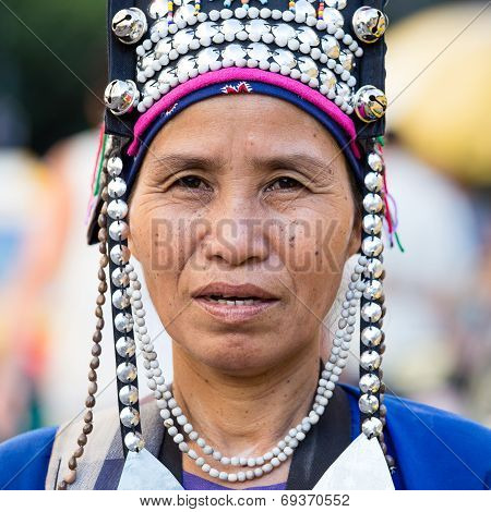Unidentified Akha Indigenous Hill Tribe Woman In Traditional Clothes Sells Souvenirs , Thailand