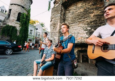 Street Musicians At The Evening Near Famous Viru Gate In Old Tow