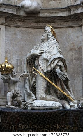 VIENNA, AUSTRIA - OCTOBER 10: Statue of Emperor Leopold praying, Plague Monument in Vienna, Austria on October 10, 2014.