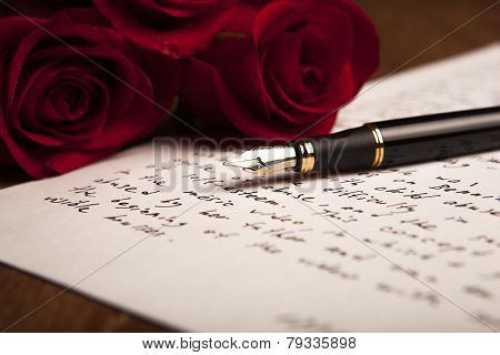 Still Life Of A Fountain Pen, Paper And Flowers Roses