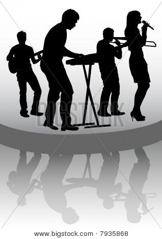 Group on stage and reflection