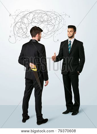 Ruthless businessman hiding a weapon and weaving plan around his head 