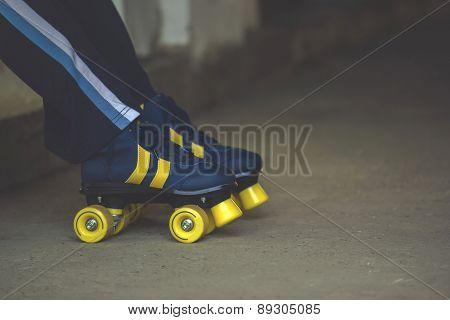 Woman Wearing Vintage Retro Quad Roller Skates
