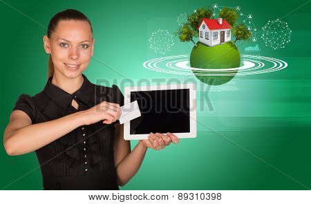 Businesslady holging blank card and tablet