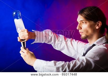 Young Man Bartender Preparing Alcohol Drink