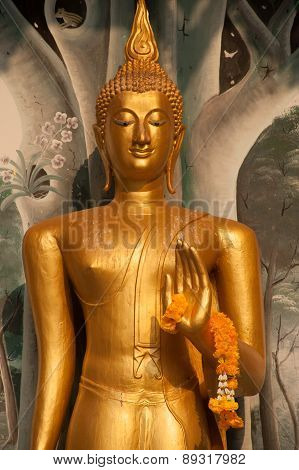 Standing Buddha Front Of Church On Thai Temple In Thailand.