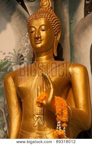Standing Buddha Front Of Church On Thai Temple In Thailand.