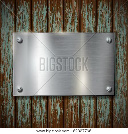 Metal Plate On A Wooden Wall