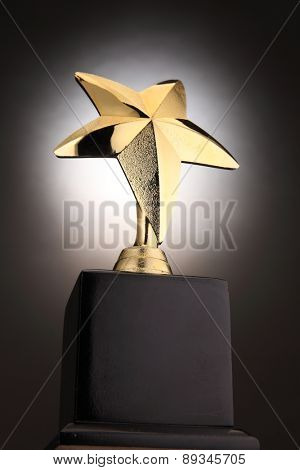 low angle of the trophy with light at the back