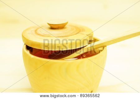 Honey In A Wooden Bowl
