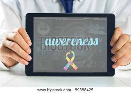 The word awereness and autism awareness ribbon against medical biology interface in blue