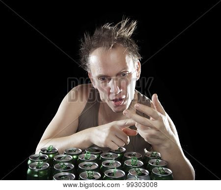 The tipsy man with the tousled hair with astonishment counts empty beer cans