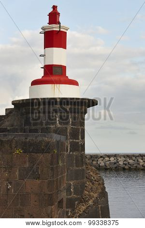 Red And White Lighthouse In Povoacao, Sao Miguel, Azores. Portugal