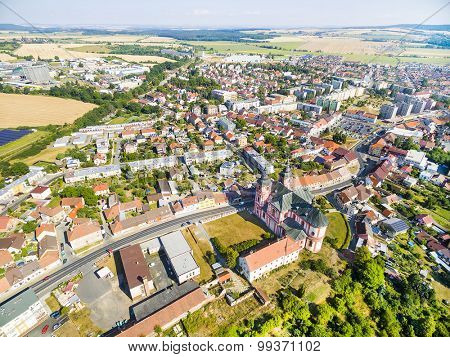 Aerial view to Prestice town with rare baroque church of The Assumption (Nanebevzeti Pany Marie) buildt  in 1775.