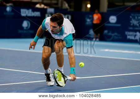 KUALA LUMPUR, MALAYSIA - SEPTEMBER 27, 2015: Mischa Zverev of Germany plays in his qualifying match at the Malaysian Open 2015 Tennis tournament held at the Putra Stadium, Malaysia.