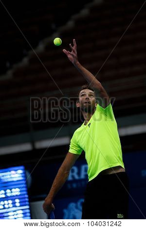 KUALA LUMPUR, MALAYSIA - SEPTEMBER 30, 2015: Ivo Karlovic of Croatia serves the ball in his match at the Malaysian Open 2015 Tennis tournament held at the Putra Stadium, Malaysia.