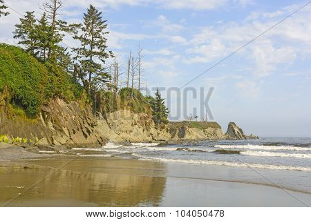 Rugged Cliffs On An Ocean Beach