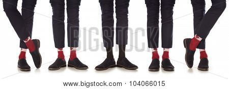 Man leg in suit and red socks, isolated on white