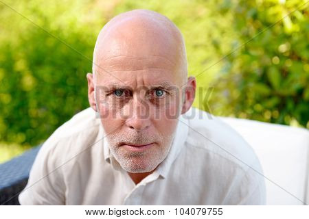 Average Age Man Looks Spitefully Camera