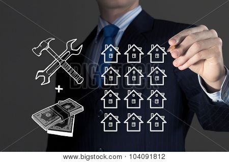 Close up of businessman drawing money making formula