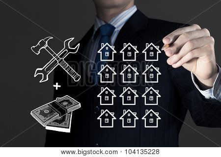 Close up of businessman drawing money making formula