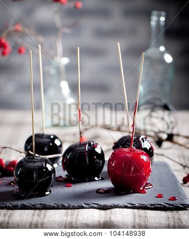 Halloween black and red caramelized apples