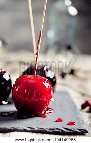 Halloween black and red caramelized apples