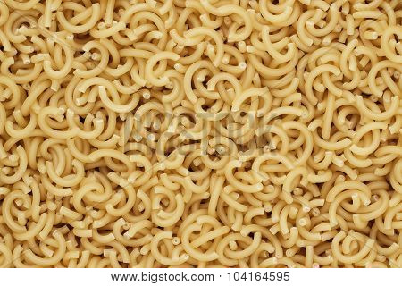 dry uncooked pasta texture background
