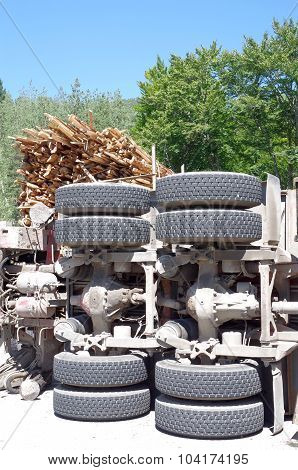 Crashed Overturning Truck With Firewood