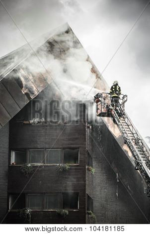 Fireman And Burning Roof